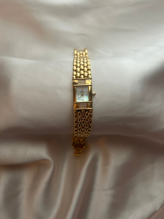 Gold Jules Jurgensen watch with mother of pearl face