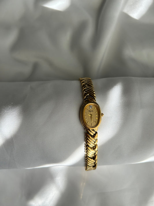 Gold Bulova watch