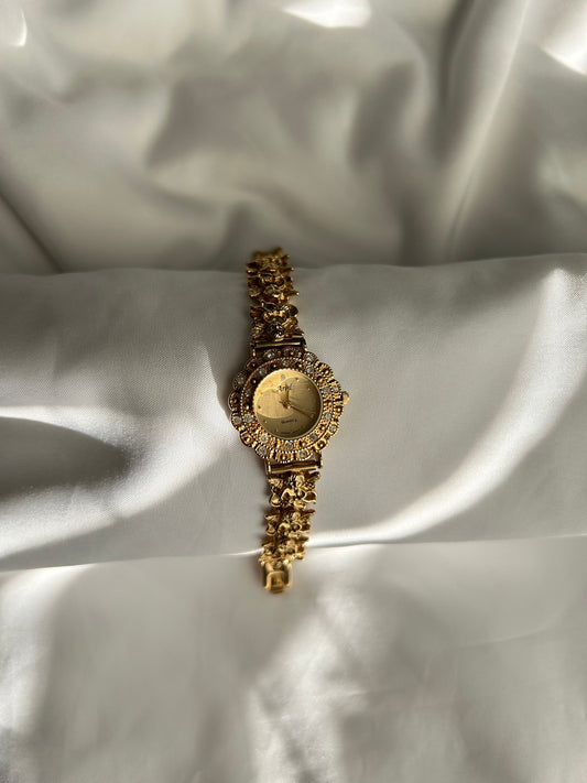 Gold cherub watch